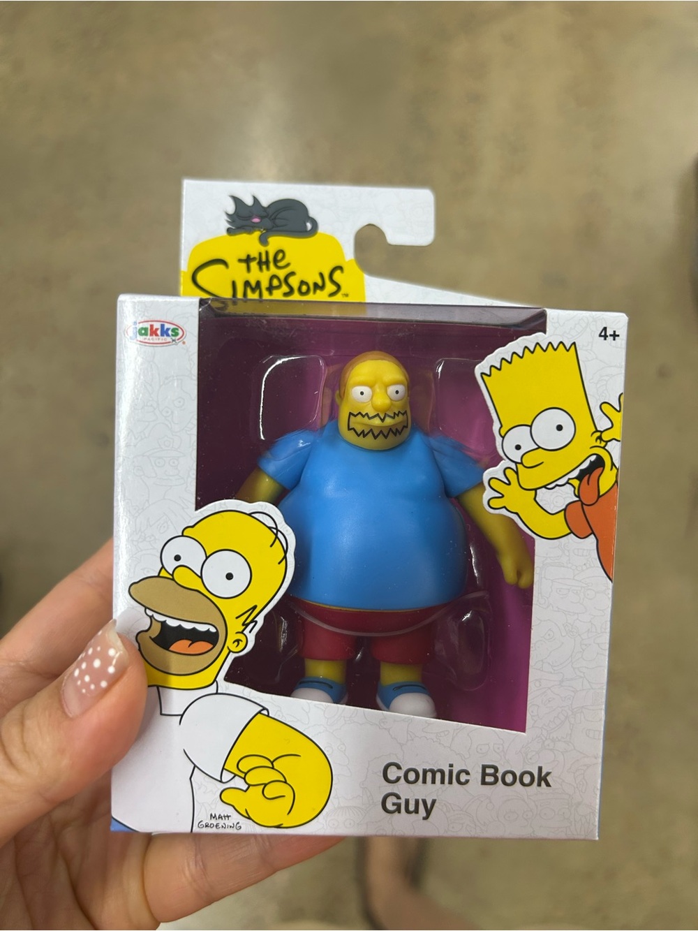 The Simpsons comic book guy Figure